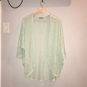 A teal cardigan